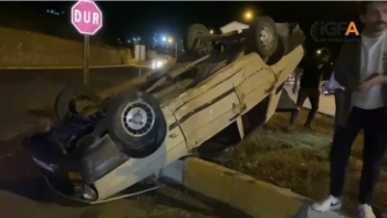 Takla atan otomobilden burnu bile kanamadan çıktı